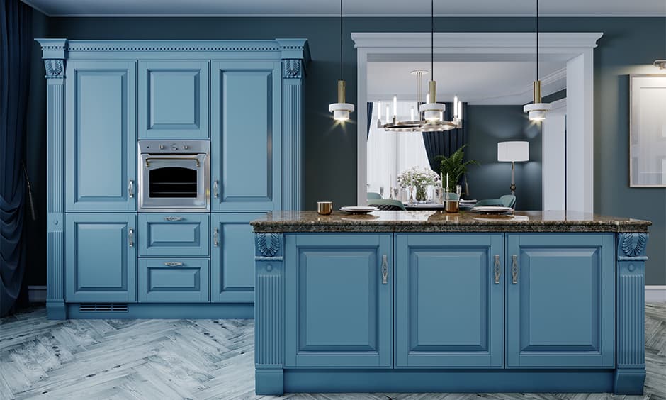 blue kitchen cabinets with grey wall